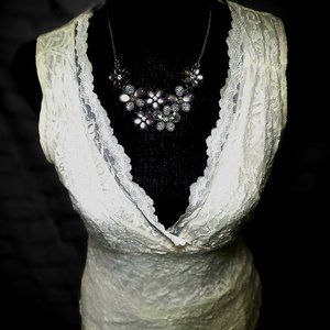 Two things for sale here the cream of light dance and lace antique cream shirt.